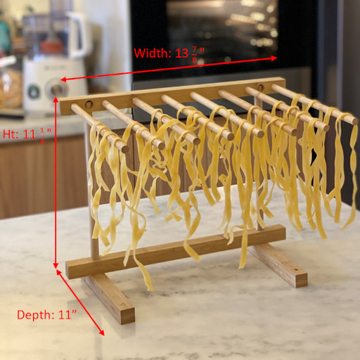 Dimension of pasta drying rack is width 13 7/8, height 11 1/6, depth 11 inches.