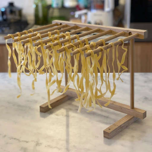 Pasta drying on pasta drying rack
